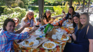 Guide explaining wine tasting notes to visitors